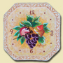 le ceramiche di Angela Occhipinti - orologio con uva r frutta